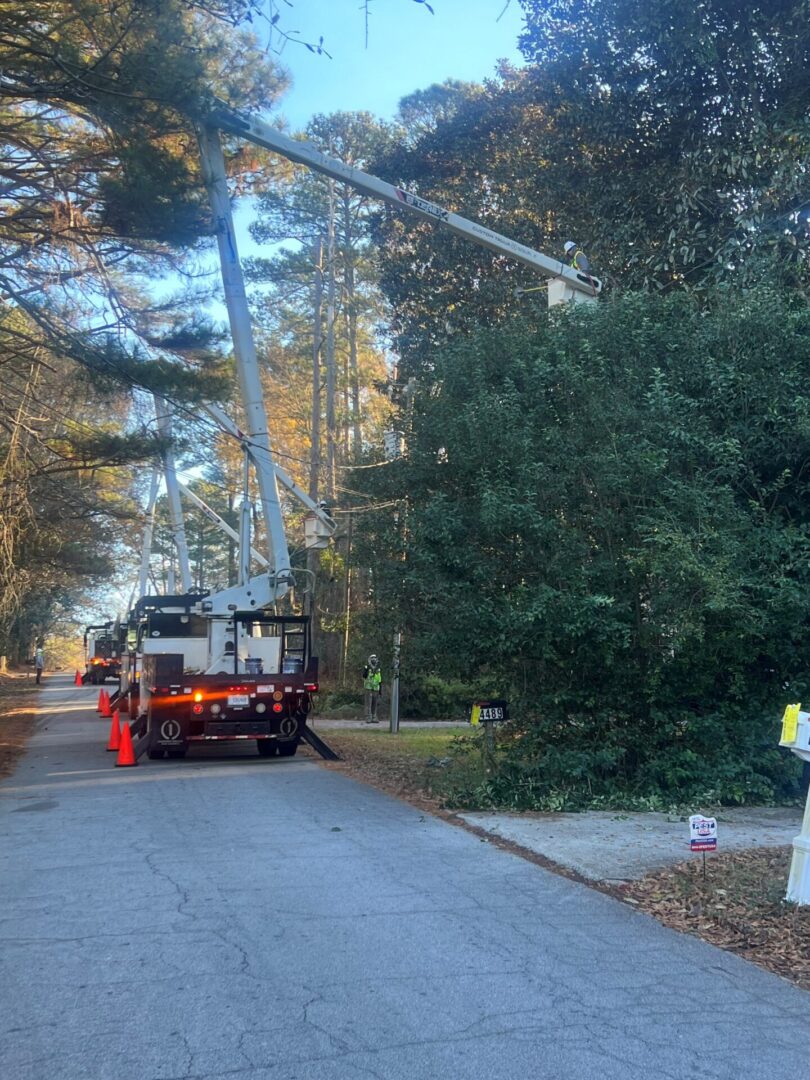 A utility truck is parked on the side of the road.